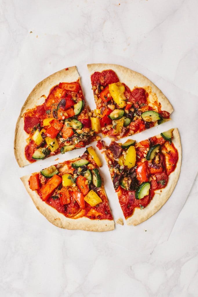 Vegan Tortilla Pizza with spicy arrabiata sauce and Mediterranean vegetables - only 180 kcal per pizza! Gluten-free option.