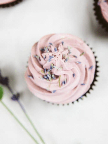 Rich vegan chocolate cupcakes with a purple lavender buttercream frosting
