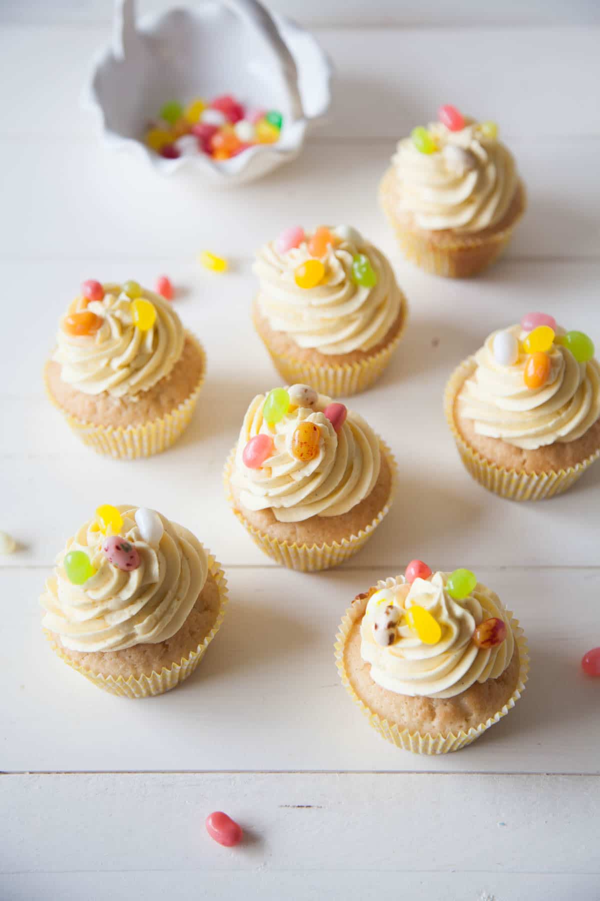 Vegan Lemon Cupcakes for Easter - Light, fluffy lemon cupcakes topped with dairy-free zesty buttercream and jelly beans!