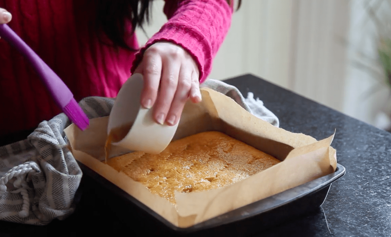 Gluten-free Vegan Lemon Polenta Cake - Step by Step Recipe - Pouring on the syrup