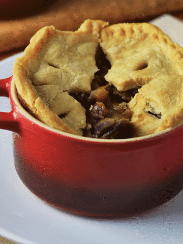 Easy Mushroom & Ale Pies with shortcrust pastry lid, for a comforting weeknight meal.